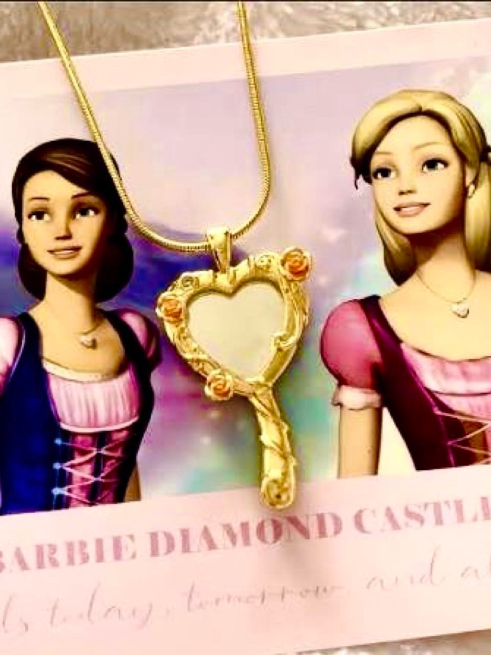 Barbie and the diamond castle heart mirror necklace.